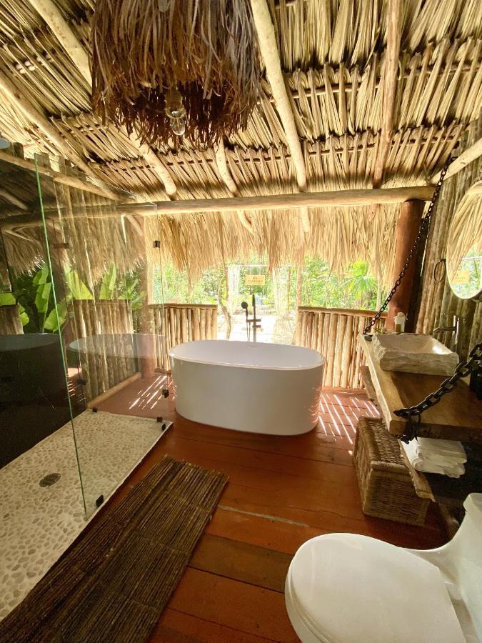 ホテル Nuscaa Boutique Tree House & Spa プエルト・モレロス エクステリア 写真